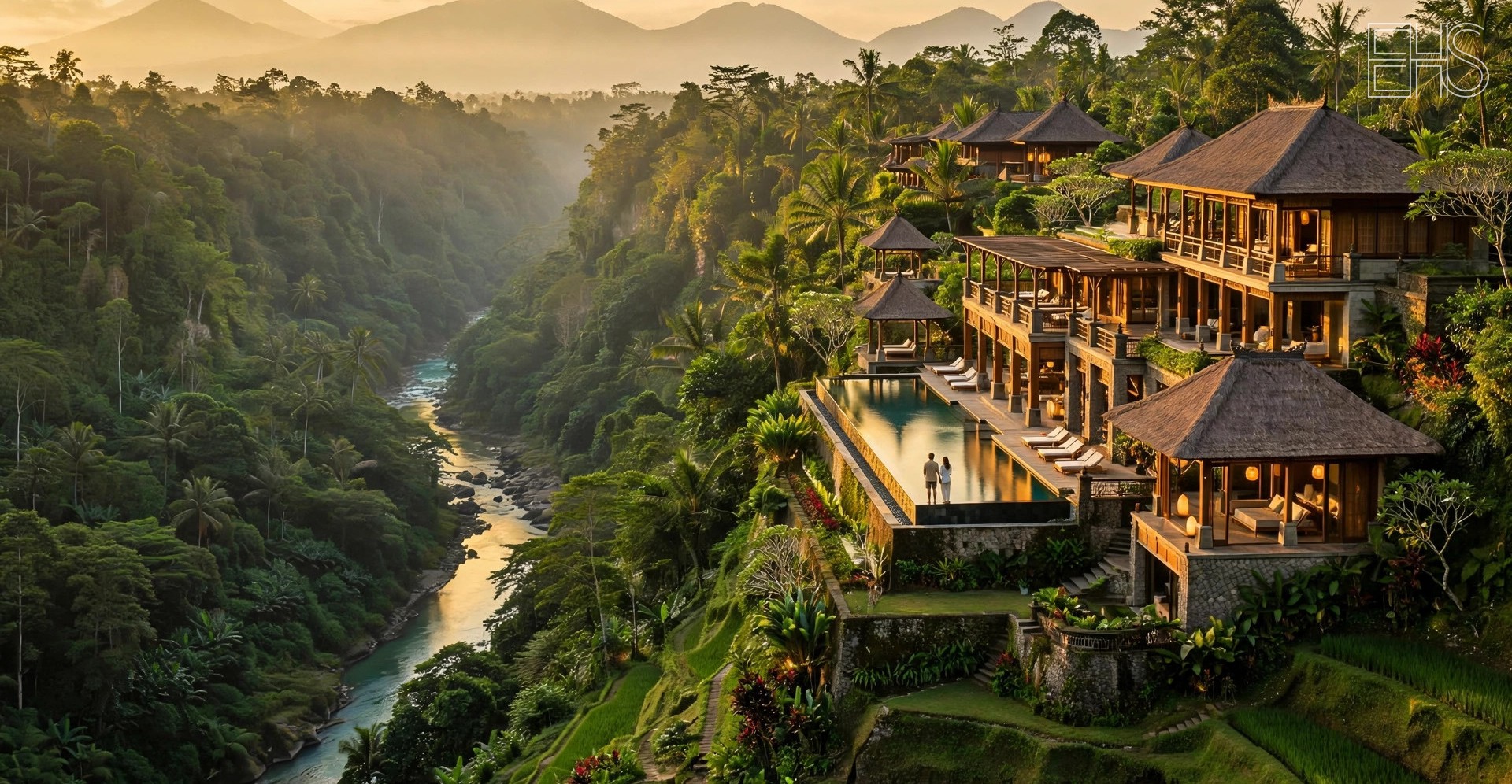 COMO Shambhala Estate: Bali's Jungle Retreat for Change | EverHealthSpan COMO Shambhala Estate's pavilions and infinity pool cascading down the jungle gorge above the Ayung River at golden hour, a couple for scale